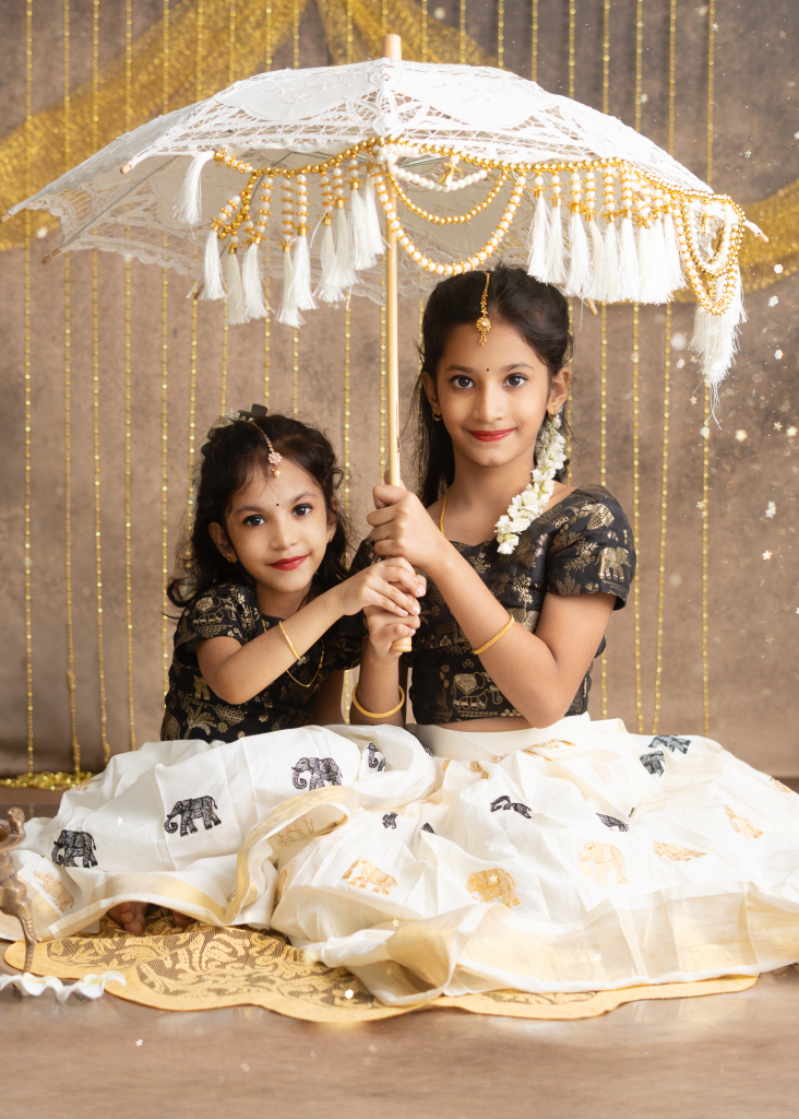 Two girls in traditional LilVastr outfits